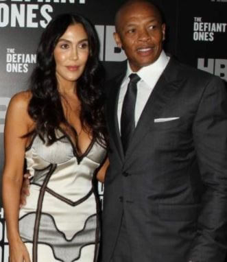 Andre Young Jr. father Dr. Dre with former wife Nicole Young in an event.
